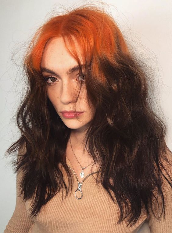Medium dark waves with vivid orange ghost roots and loose texture.