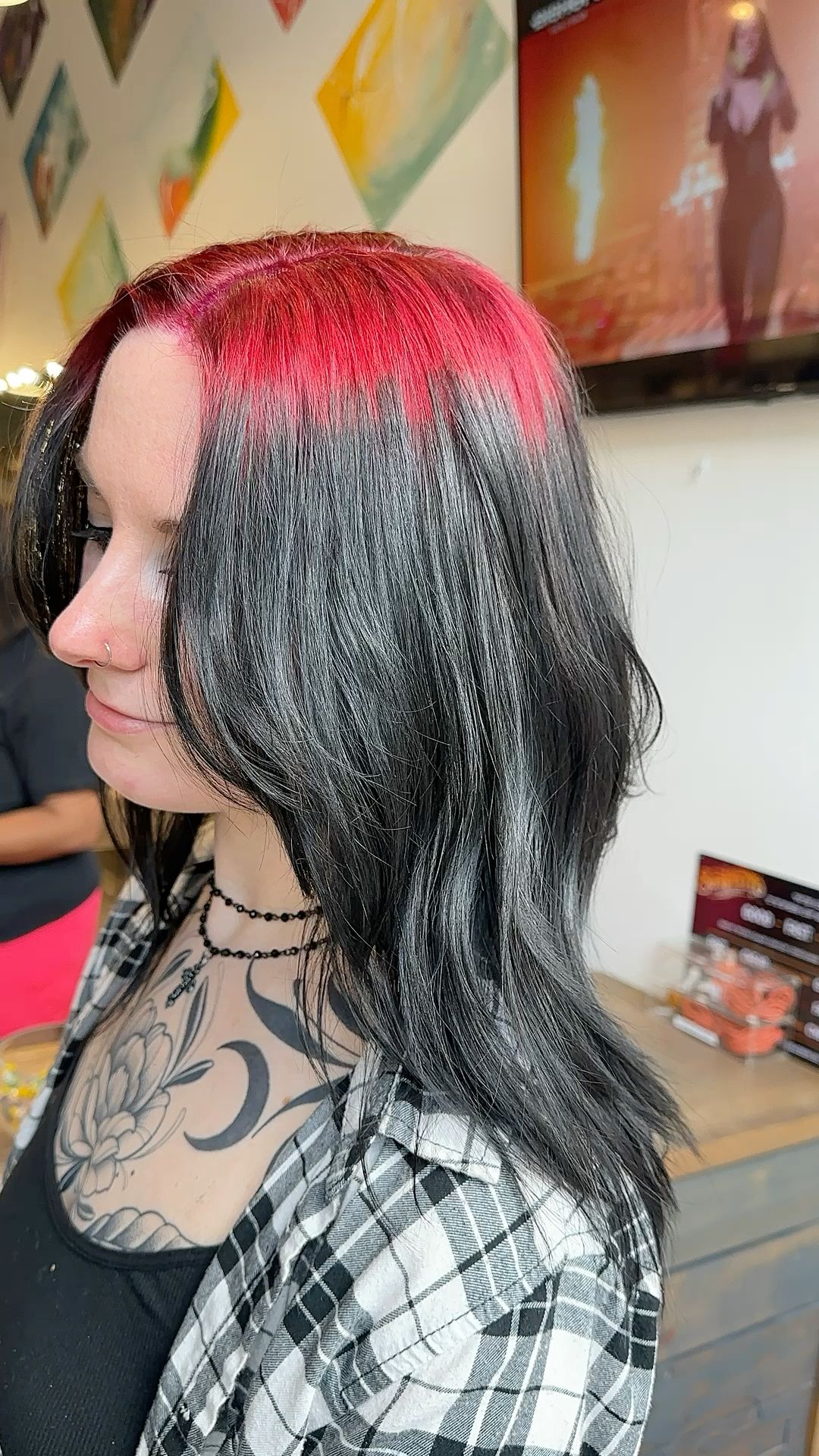 Charcoal black waves with hot pink ghost roots sweeping across the top section.