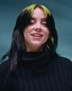 Black shoulder-length hair with chartreuse ghost roots and a center-part shape.