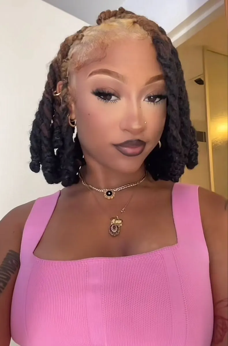 Black hair with Honey Blonde ghost roots, Medium Soft Locs, Front Portrait.